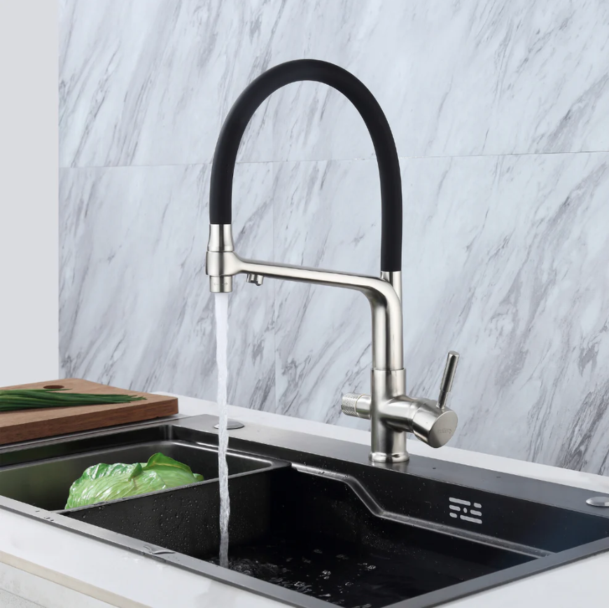 3-way kitchen tap for filtered water installed in modern kitchen sink
